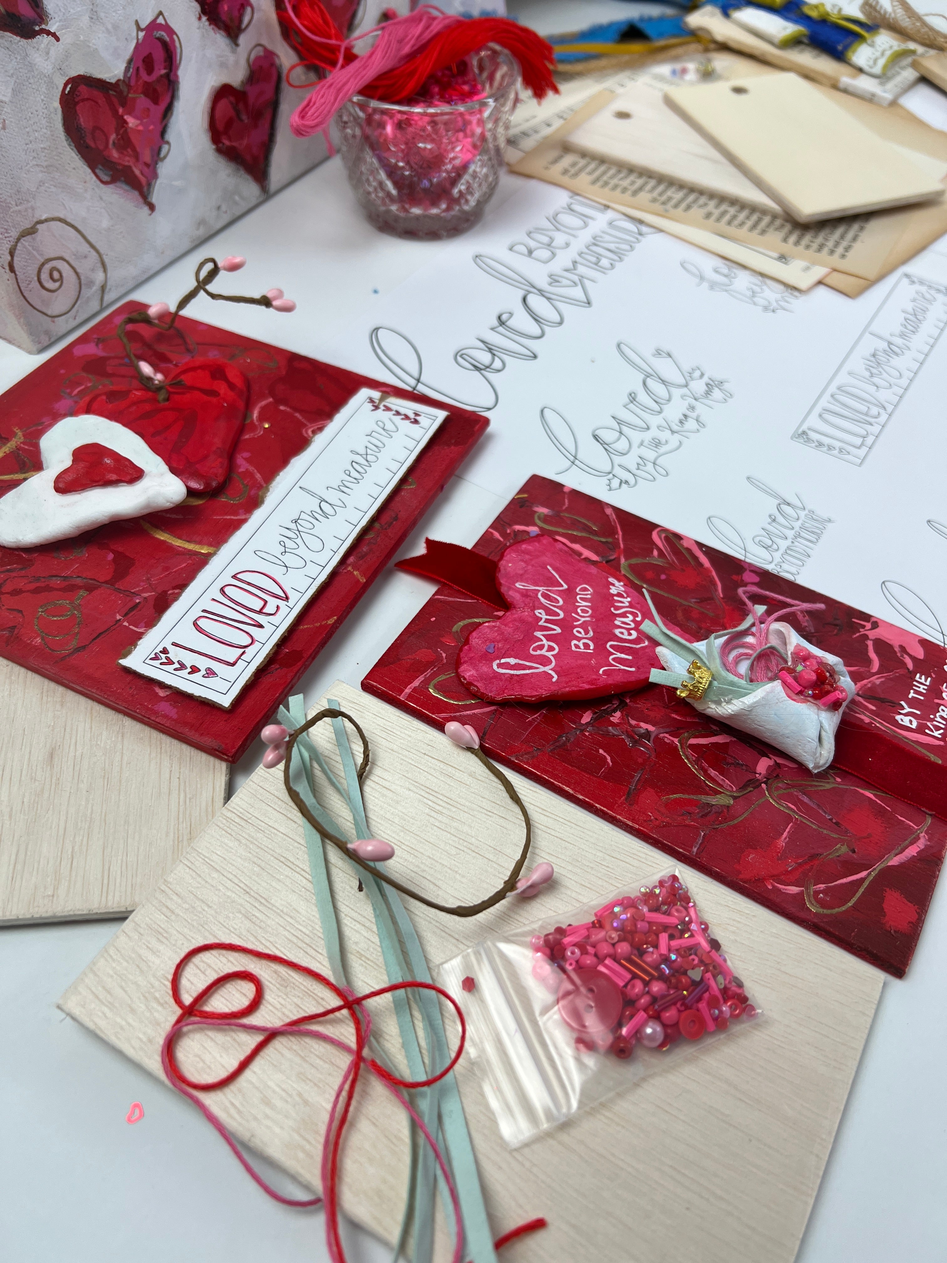 Kit contents with finished project pieces.  Clay on Painted Wood.